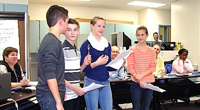 Middle School Student Council Shows a Spoodle to the Lansing Board Of Education