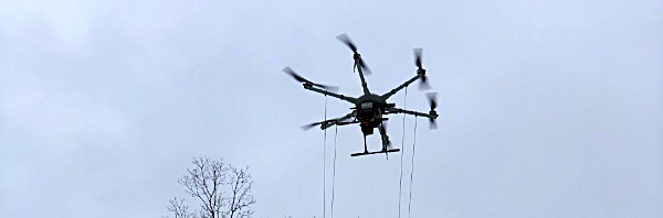 nyserda A drone hauls a pack of elaborate sensing equipment during surveys of the Southern Tier earlier this year for magnetic anomalies that will be mapped to find abandoned wells